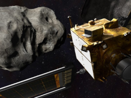 Illustration of NASA's DART planetary-defense mission approaching an asteroid