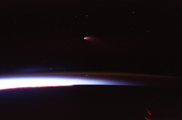 Comet Hale-Bopp, co-discovered by amateur Thomas Bopp, photographed from Space Shuttle Columbia in 1997